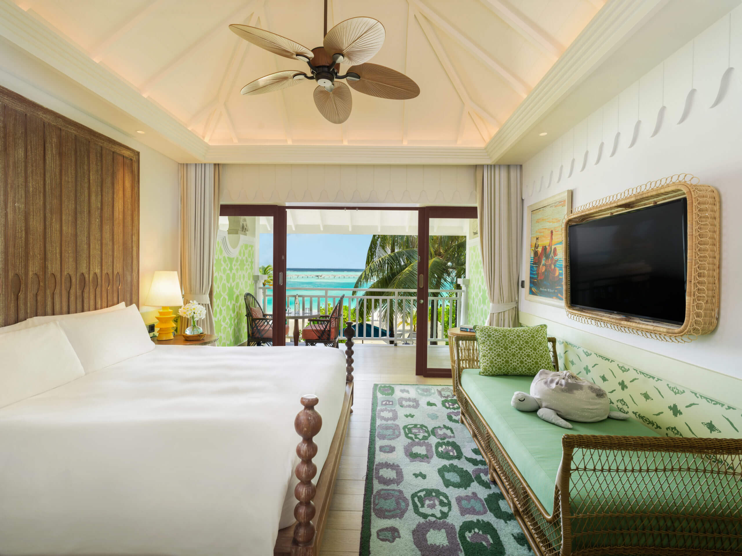 Sky king bed room view from the room to balcony and lagoon