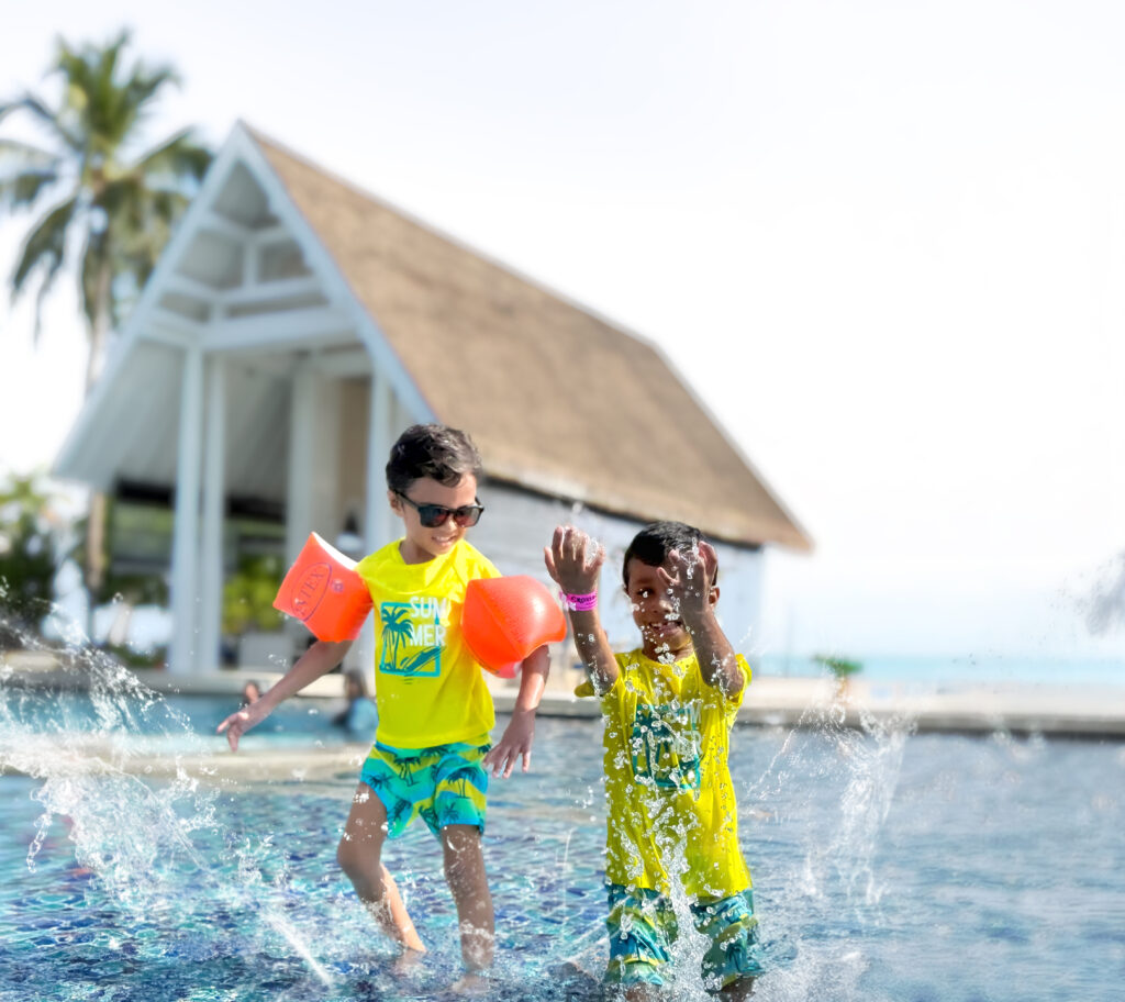 Kids playing in pool